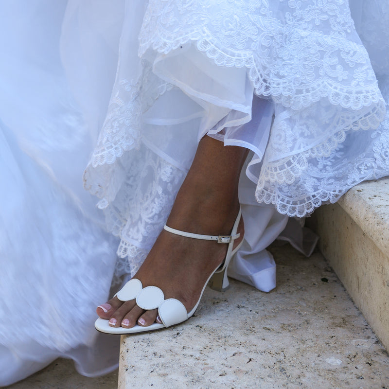 White Geo Sandal shown with Amal in White strap sold separately, featuring a polished geometric design.