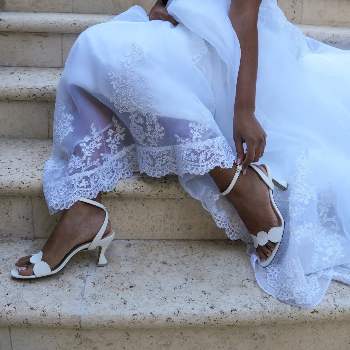 White geometric bridal sandal with Marilyn detachable cross-back strap, genuine leather upper, and a 3-inch recycled plastic heel by Alterre.