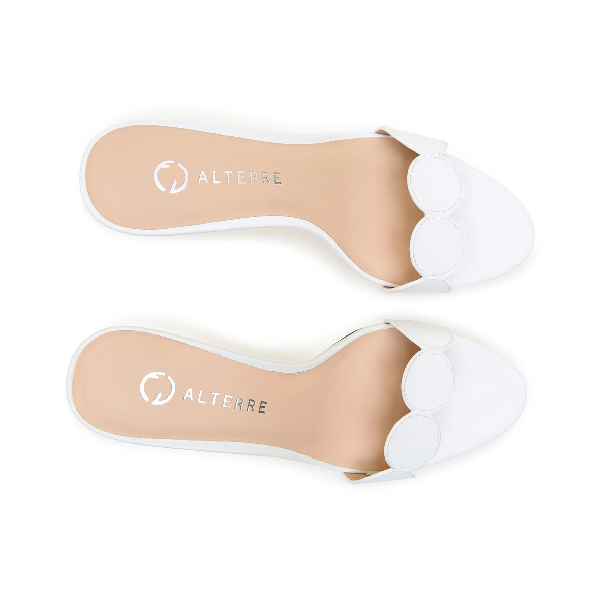 Comfortable white leather bridal sandal with Italian Riviera-inspired geometric detail and detachable strap compatibility by Alterre.