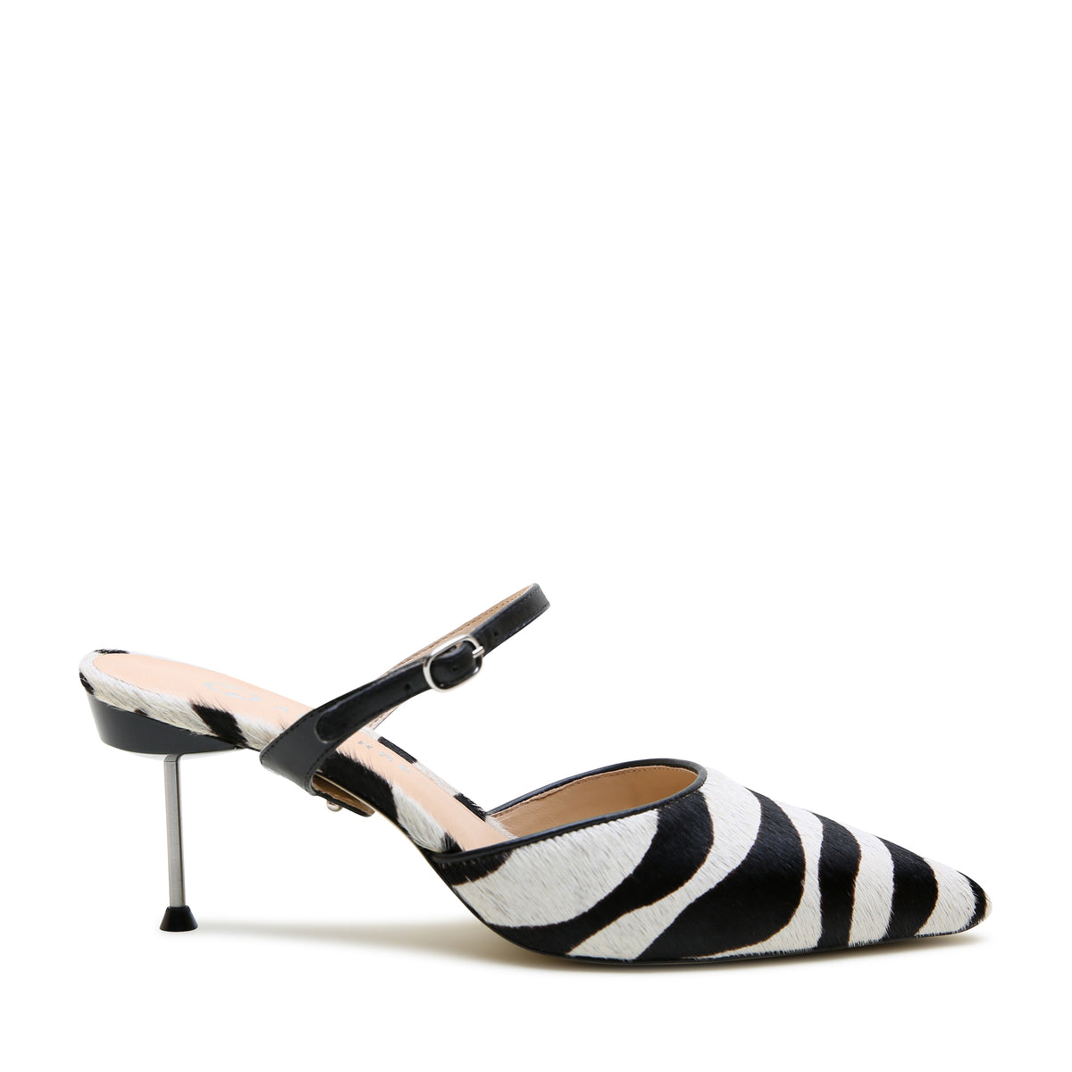 White Zebra Stiletto + Black Twiggy Strap by Alterre, featuring printed calf hair, 3-inch heel, and unique but versatile black and white zebra stiletto mule.
