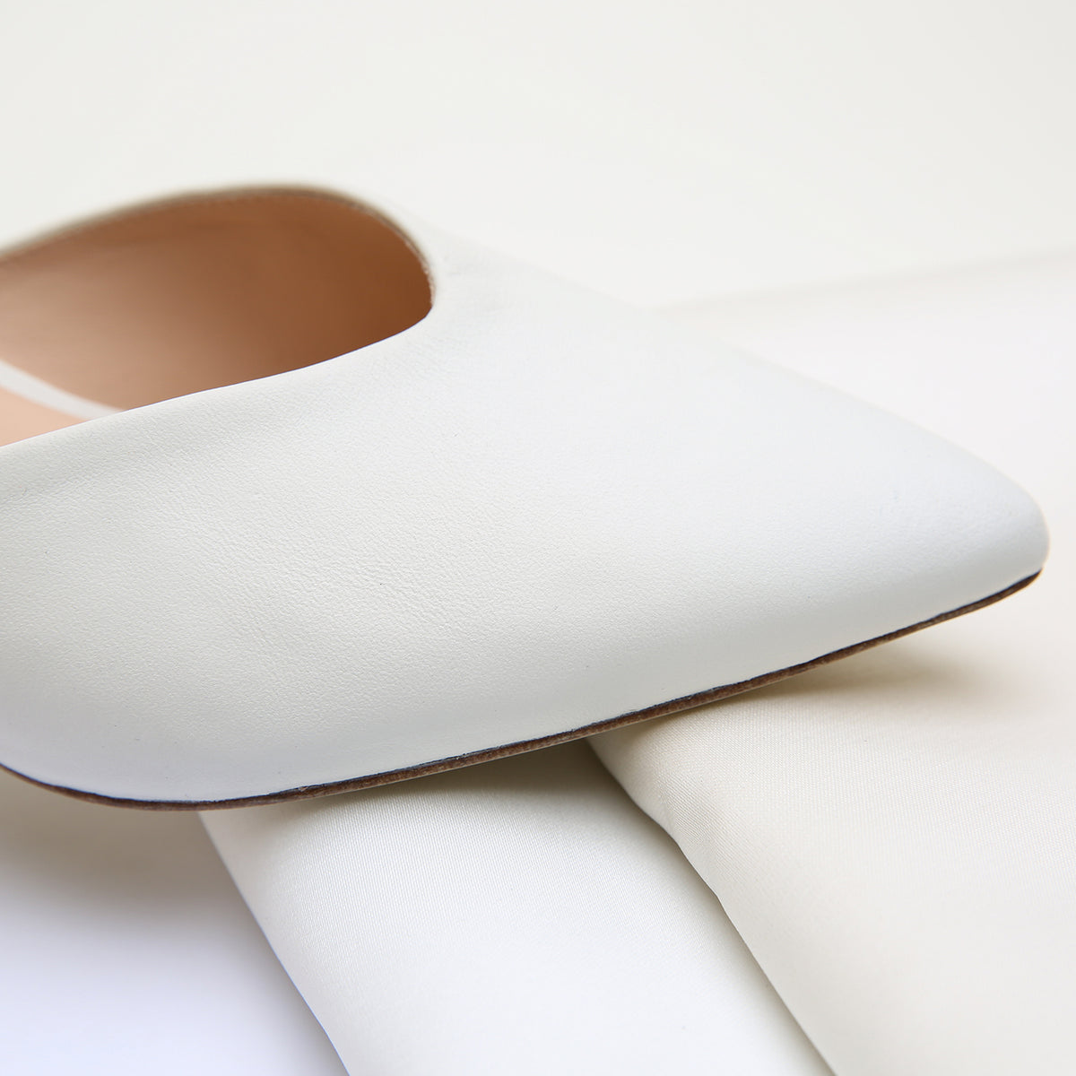 White V Mule by Alterre, featuring leather upper with composite leather sole, a 3-inch heel, a cushioned foam insole, and interchangeable strap compatibility.