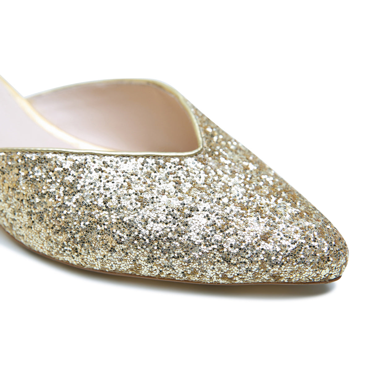 Alterre Gatsby Glitter V Slide combines glitter fabric upper, leather piping/lining, and composite leather sole with a 1.5-inch heel, a cushioned foam insole and interchangeable strap compatibility for versatile styling.