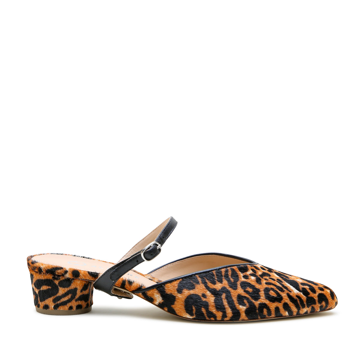 Jaguar V Slide + Black Twiggy Strap by Alterre, featuring printed calf hair, 5-inch heel, and versatile and elevated cousin of leopard.