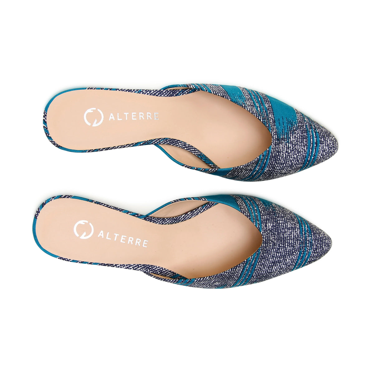 Comfortable teal slide sandal in reclaimed silk with detachable strap compatibility, designed for standout everyday and occasion wear.