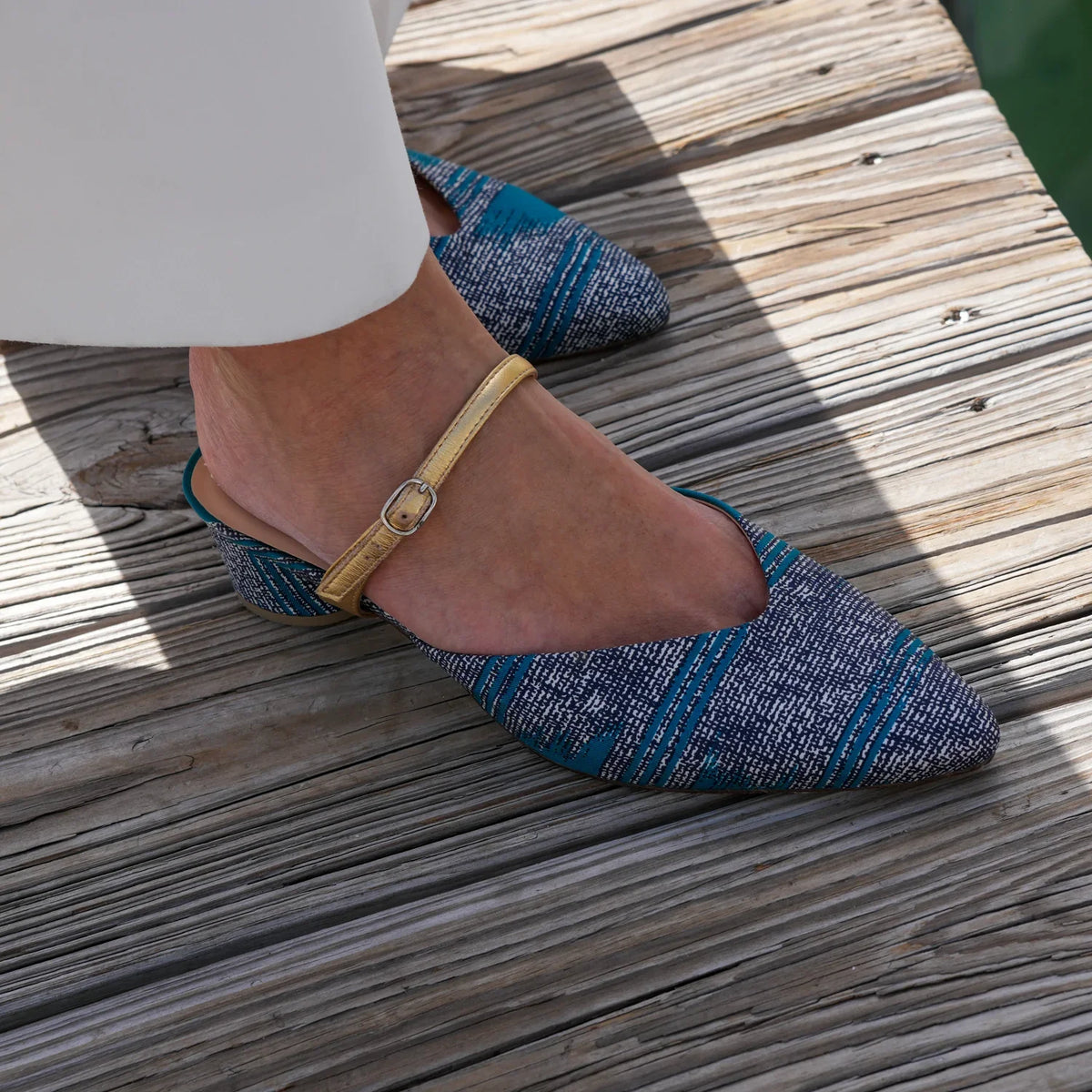 Rich teal reclaimed silk slide sandal with Gold Twiggy Strap, low block heel, leather lining, and breathable eco-leather sole by Alterre.