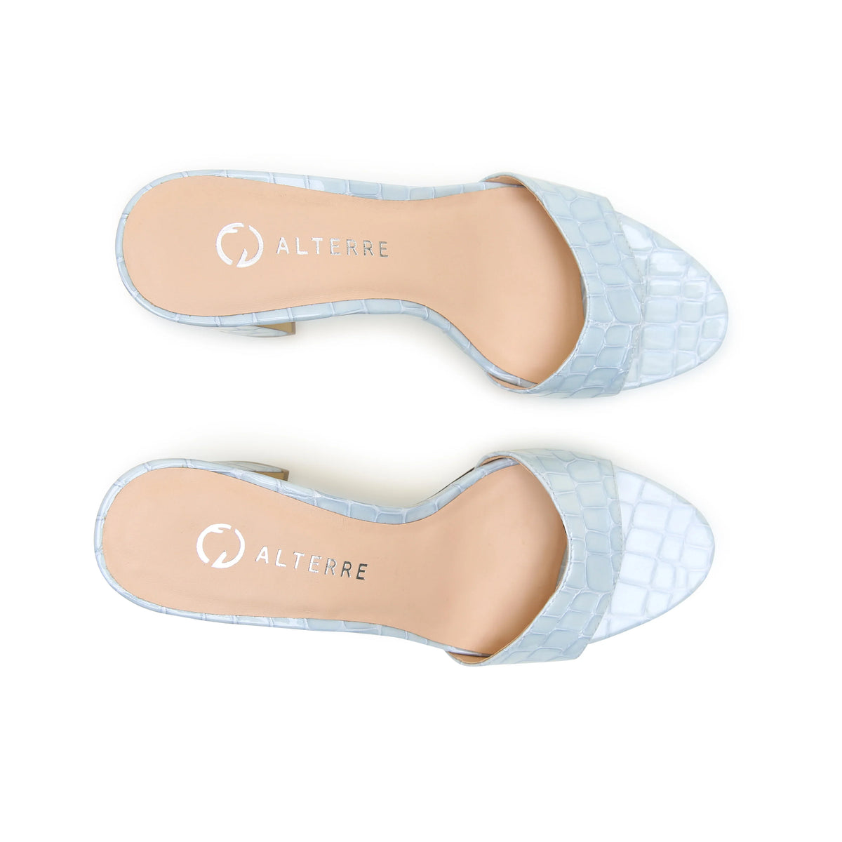 Alterre Blue Viper Wave Sandal with embossed patent croc print, comfortable block heel, and mix-and-match styling for summer soirées.