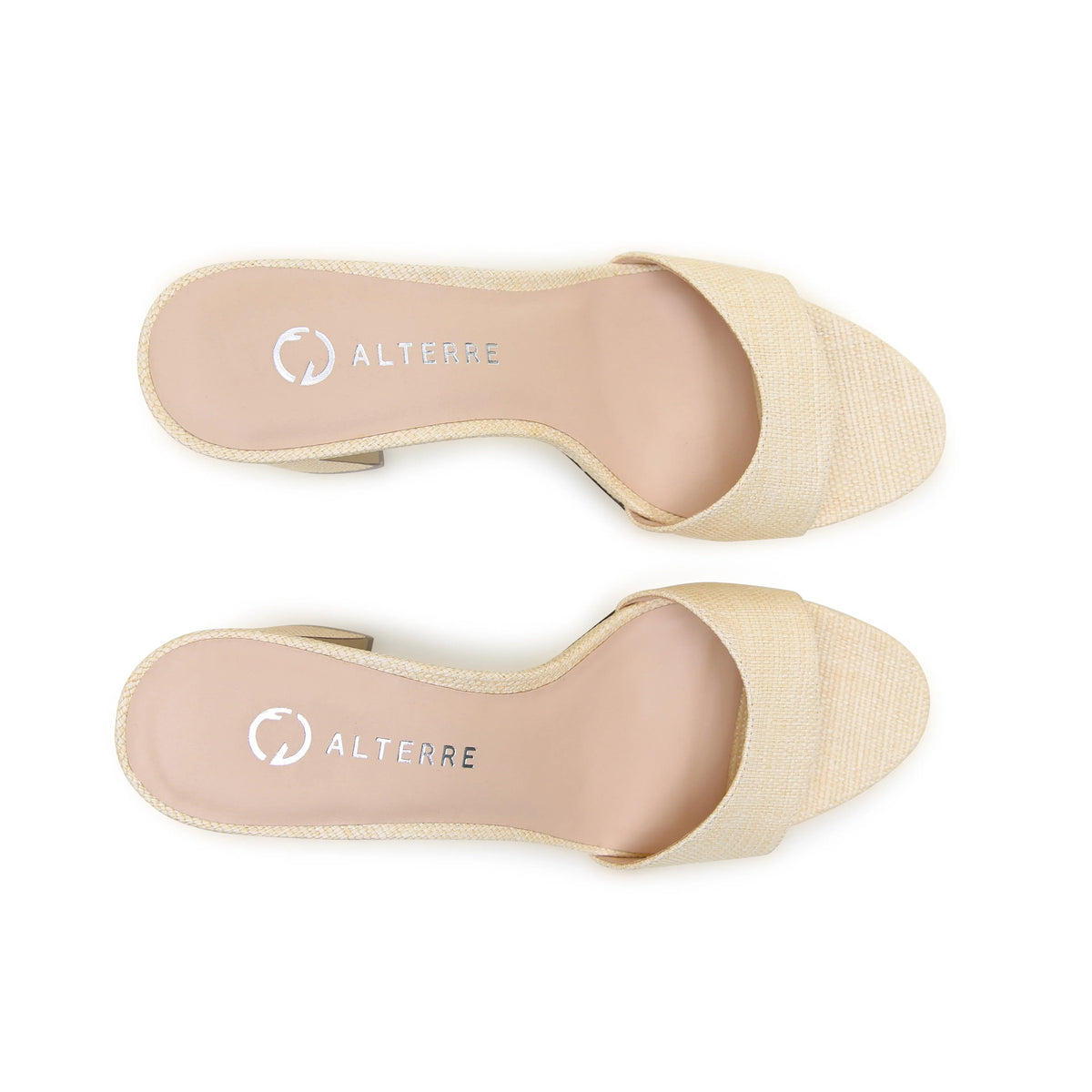 Alterre Raffia Wave Sandal with subtle sculptural detail, neutral raffia finish, and mix-and-match styling for elevated everyday wear.